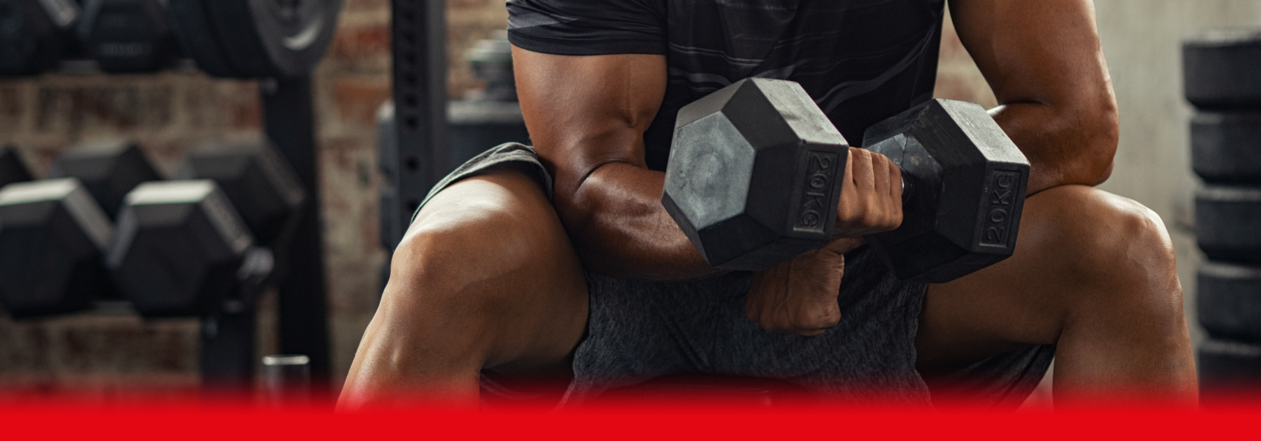 man lifting weights