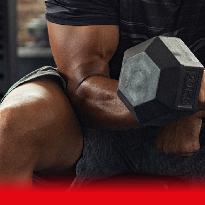 man lifting weights
