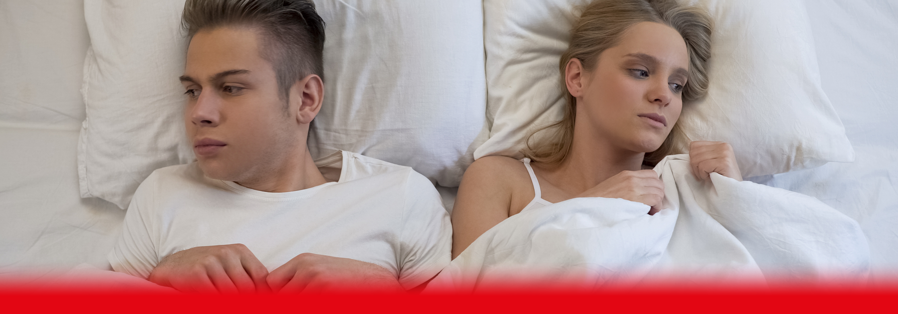 couple in bed dissapointed