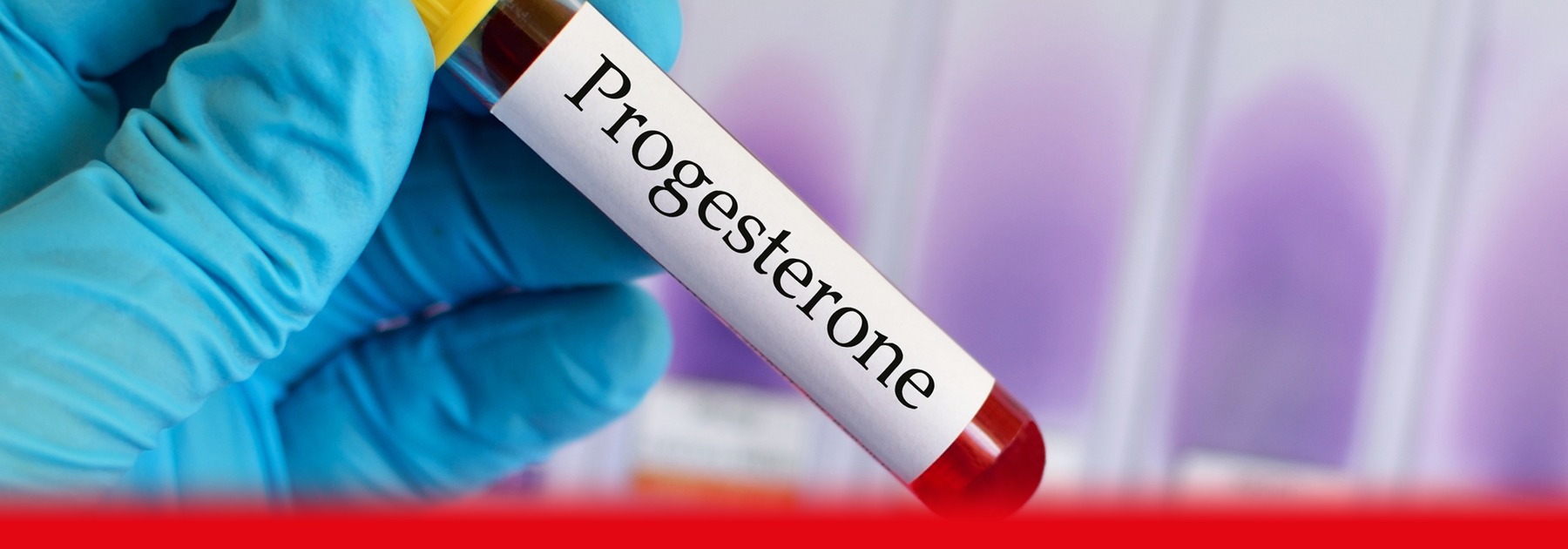 doctor holding progesterone tube