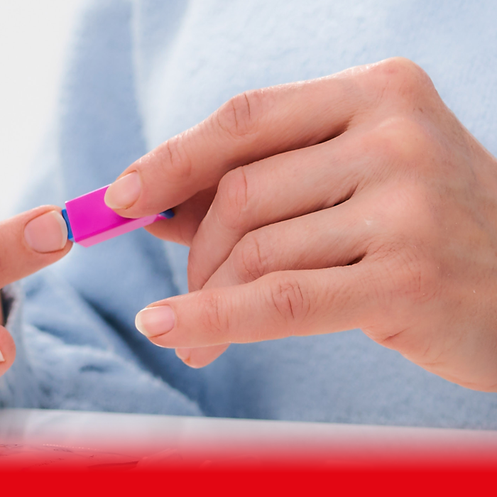 woman taking blood test