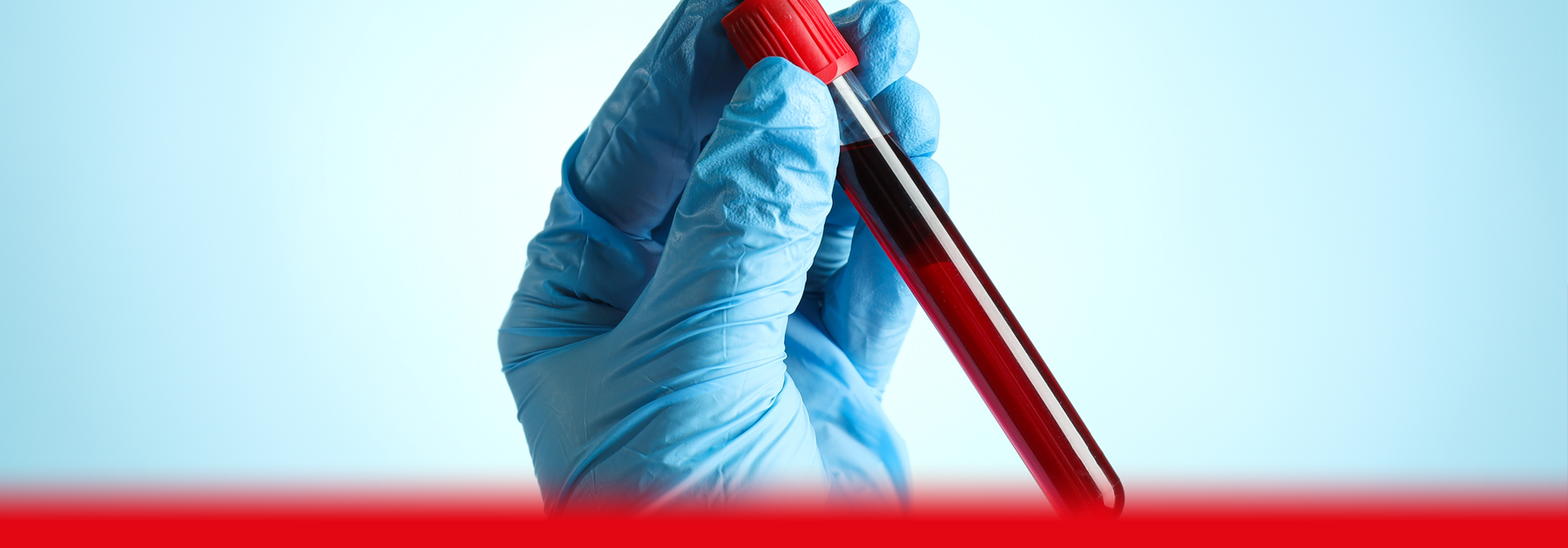 doctor holding blood sample