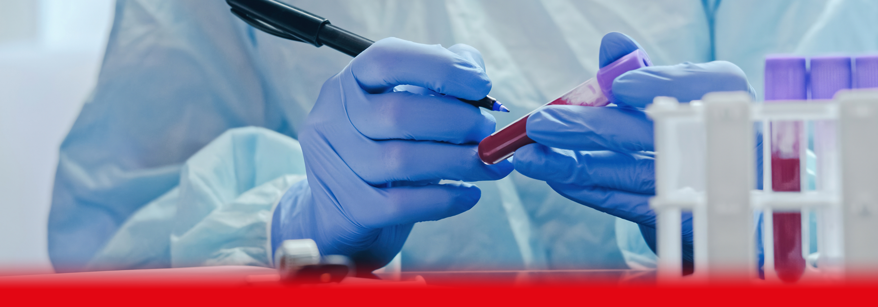 doctor labelling blood sample